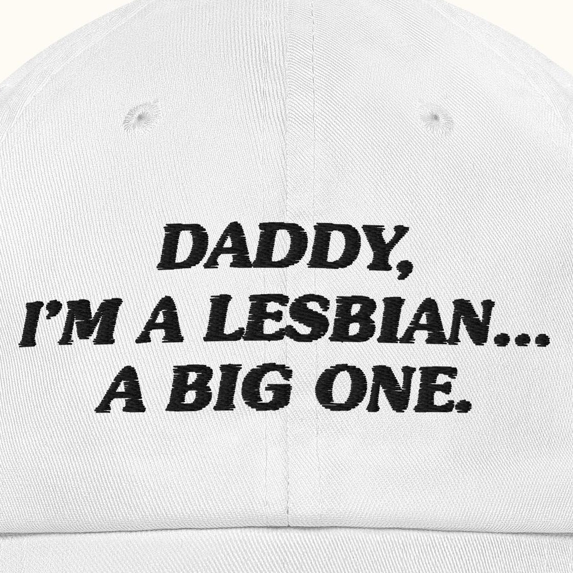 White cap with black text on a white background